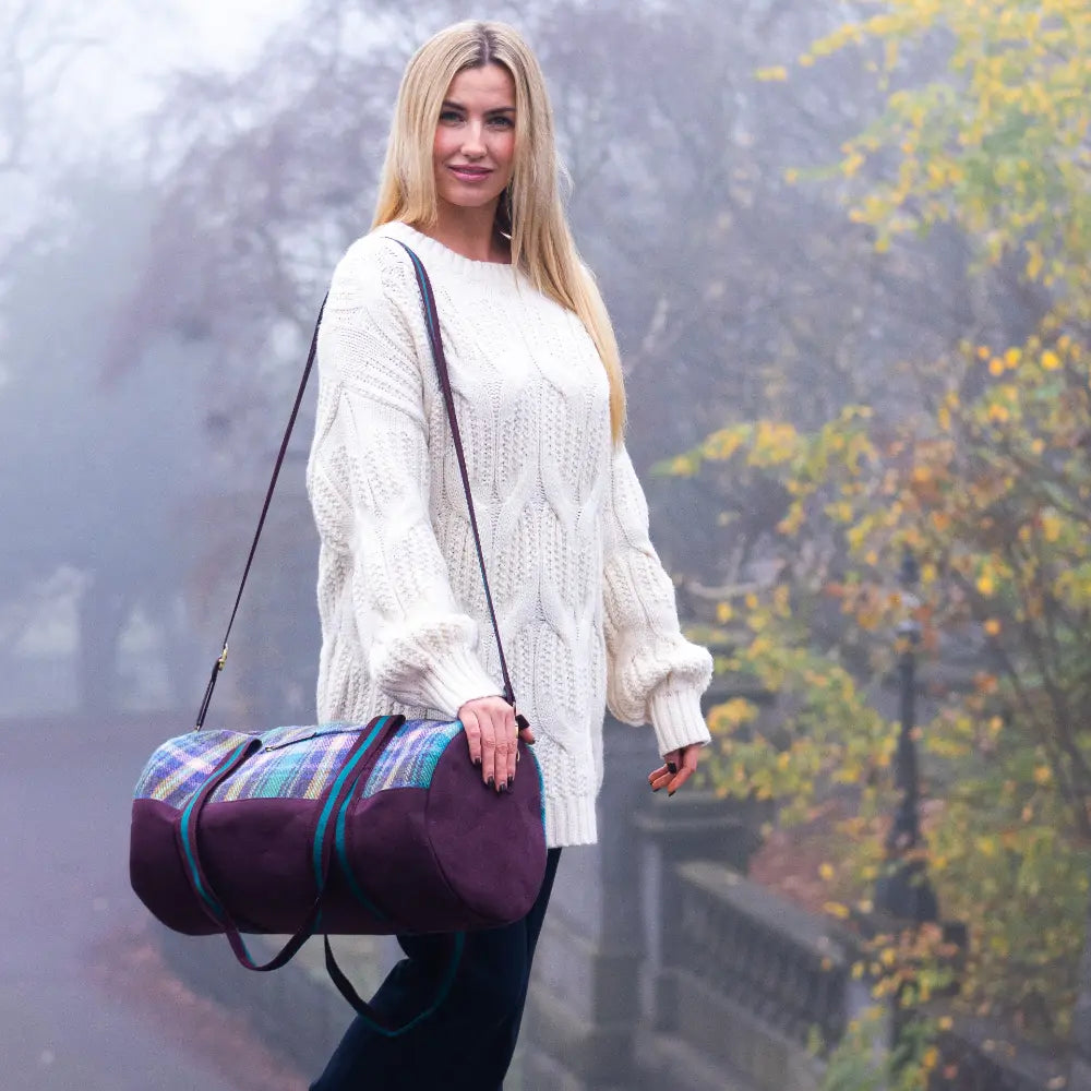 Harris Tweed barrel holdall — spacious Scottish travel gift in a range of Harris Tweed colours — lifestyle shot