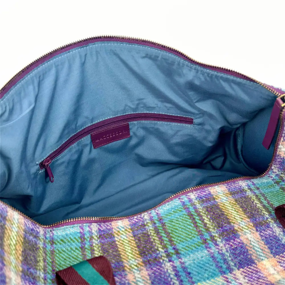Harris Tweed barrel holdall — spacious Scottish travel gift in a range of Harris Tweed colours — styled product shot