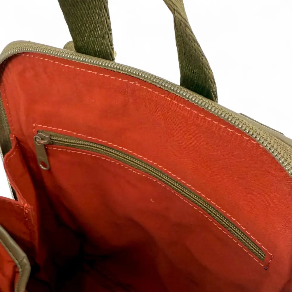 Harris Tweed mini backpack — compact Scottish gift in a range of Harris Tweed colours — styled product shot