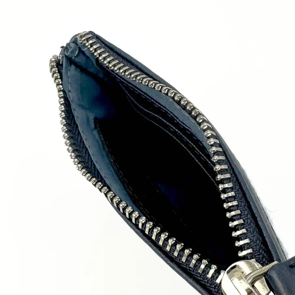 Harris Tweed coin purse — small Scottish gift in a range of Harris Tweed colours — in use