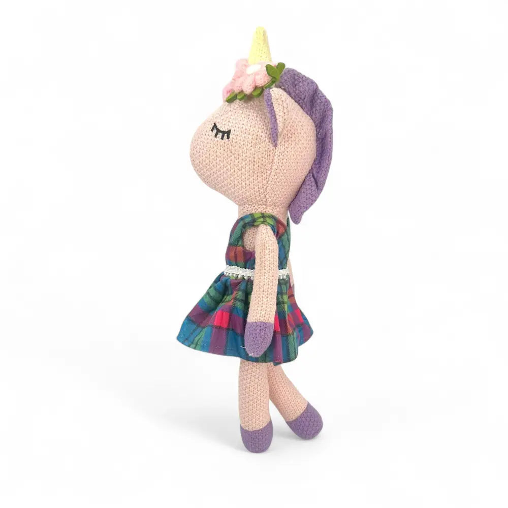 Knitted unicorn soft toy — Annie the Unicorn Scottish gift — in use