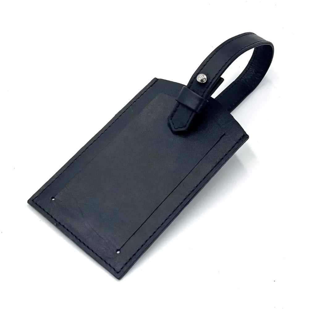 Italian leather luggage tag from Maccessori — quality travel gift — styled product shot