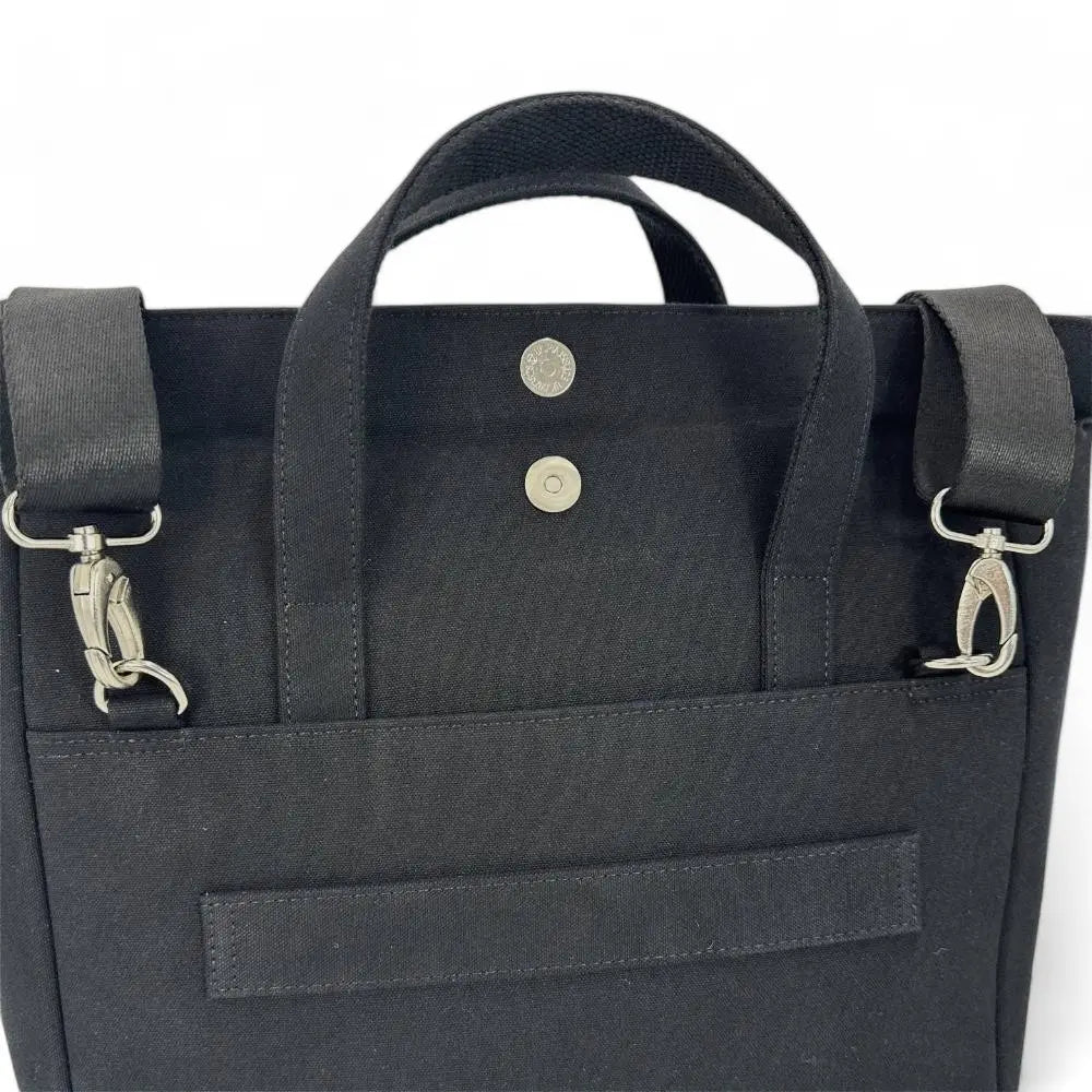 Harris Tweed travel messenger bag — practical Scottish gift in a range of Harris Tweed colours — in use