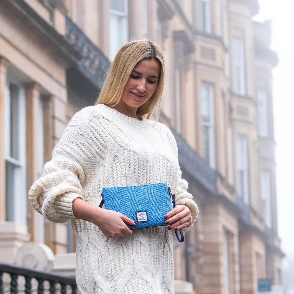 Harris Tweed zip purse bag — compact Scottish gift in a range of Harris Tweed colours — lifestyle photo
