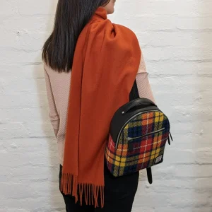 lightweight wool scarf in burnt orange with saffron yellow Harris Tweed backpack