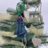 Christmas Tree Decoration made from Green and Pink Harris Tweed with green ribbon