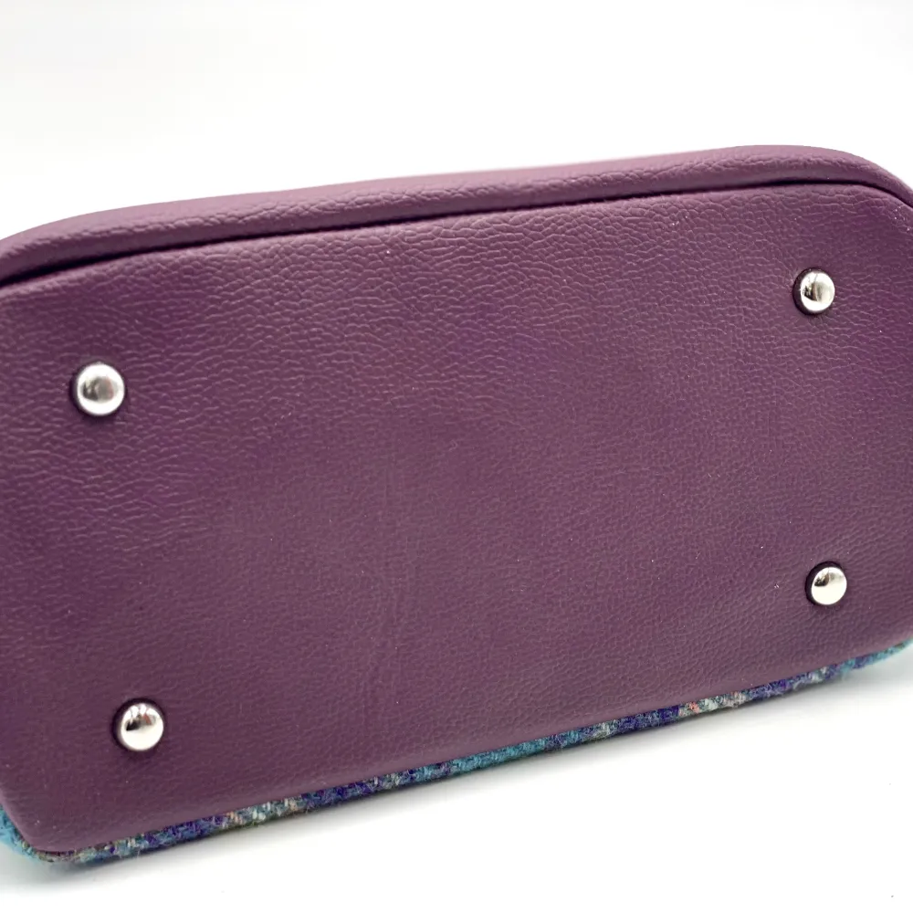 Flat bottom with bottom studs on purple vegan leather on Top Handle Handbag